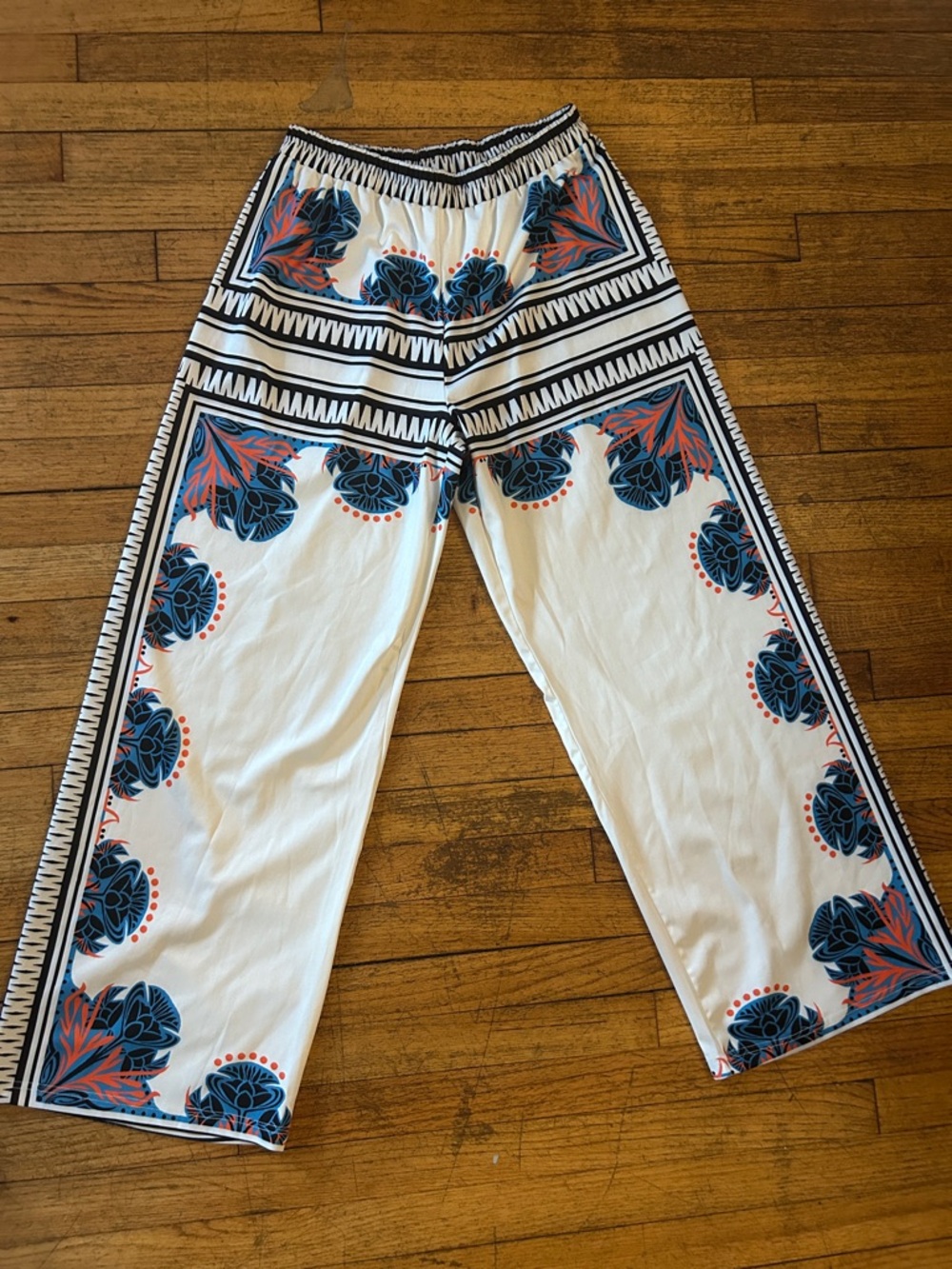 SHEIN White Wide Straight-Leg Pants with Blue & Orange Floral Print
